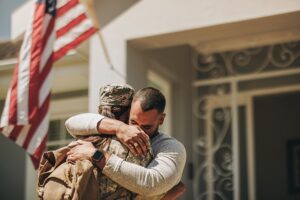 veteran couple hugging
